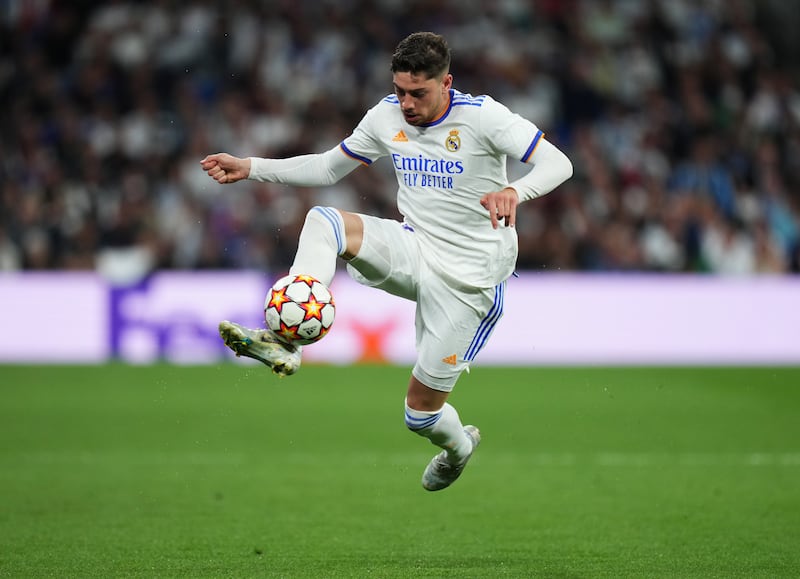 Federico Valverde - 7: Teed-up early chance missed by Benzema, tireless effort up and down pitch and some good defensive challenges. Booked for late tackle on Fernadinho. Getty