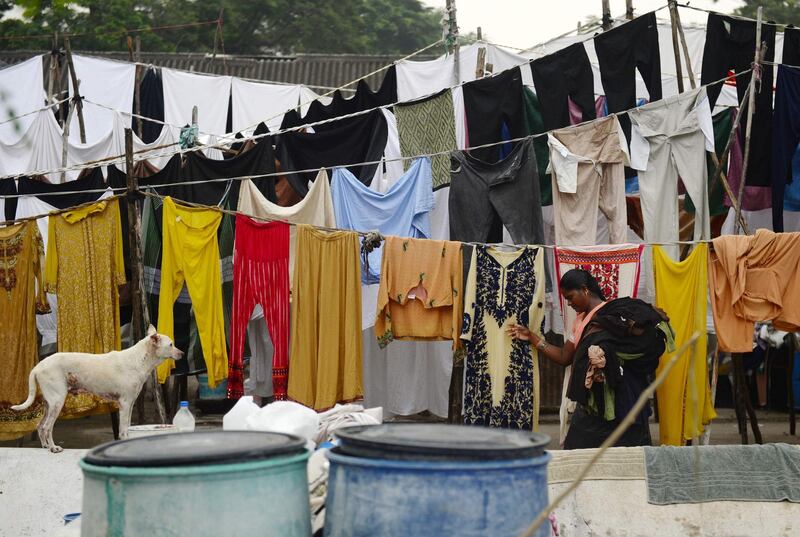 A Indian laundry worker in Chennai. Arun Sankar / AFP Photo