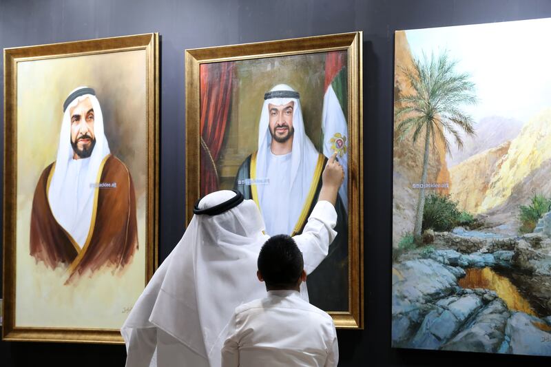 Jack Lee's portraits of UAE Founding Father, the late Sheikh Zayed bin Sultan Al Nahyan, and President Sheikh Mohamed at Adihex. Chris Whiteoak / The National