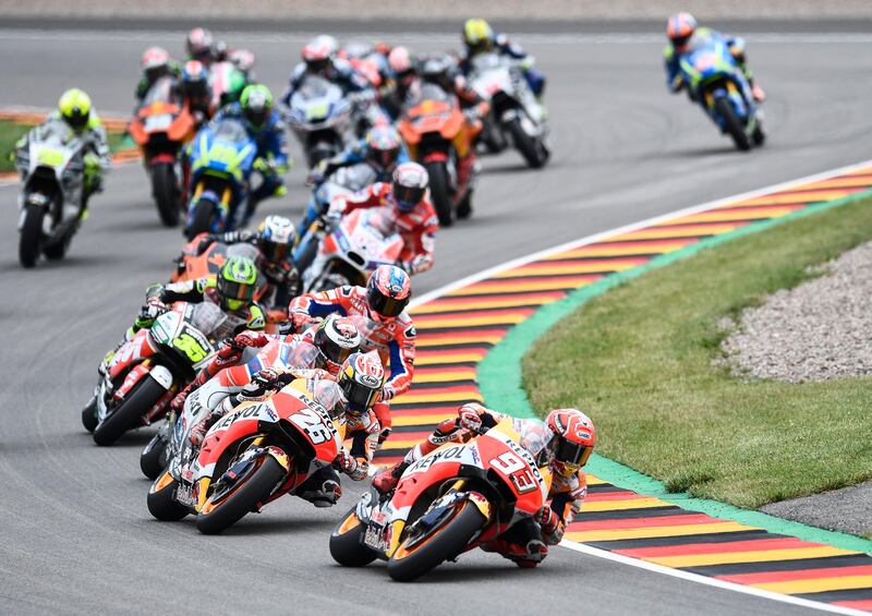 Spanish MotoGP rider Marc Marquez leads the pack during the German MotoGP race at the Sachsenring racing circuit in Hohenstein-Ernstthal. Filip Singer / EPA