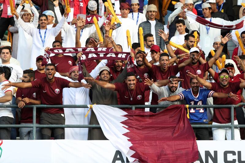 Qatar supporters cheer during the AFC Asian Cup final football match between Japan and Qatar. Karim Sahib / AFP