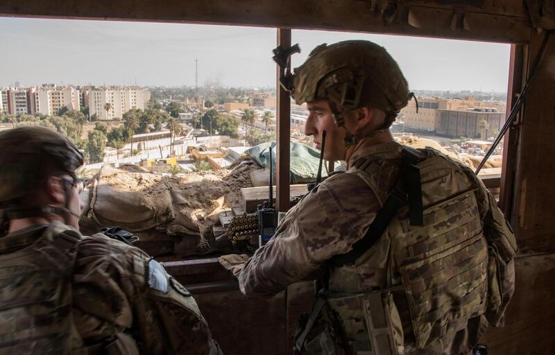 US Army soldiers keep watch on the US embassy compound in Baghdad. Reuters