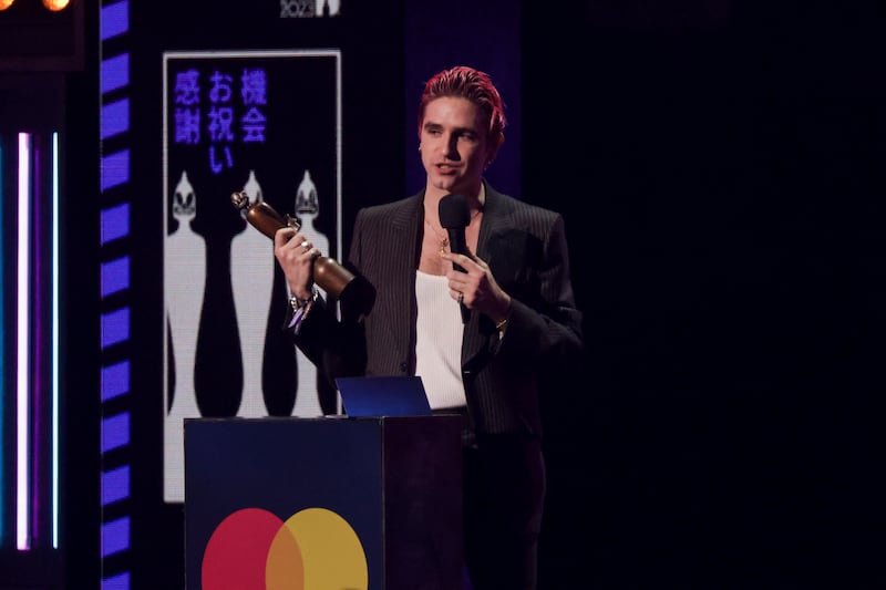 Carlos O'Connell of Irish post-punk band Fontaines DC, on stage accepting the award for International Group of the Year. AP