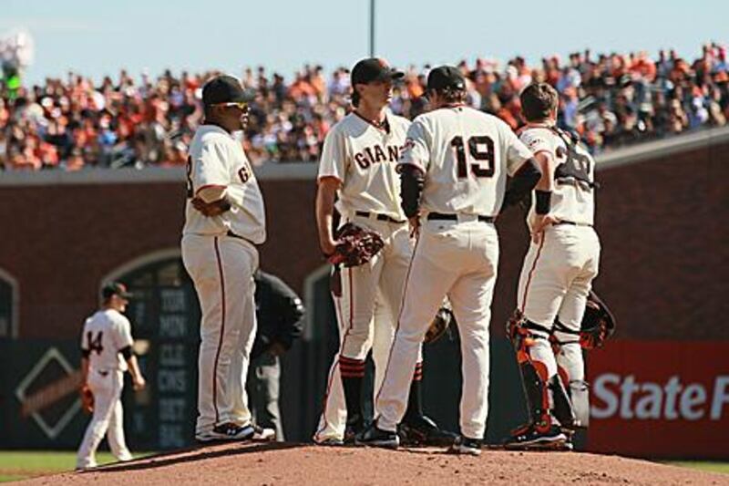 Barry Zito, centre, the San Franciso Giants pitcher, is spoken to by Dave Righetti, the team’s pitching coach on Saturday against San Diego, a game he was withdrawn from after just three innings.