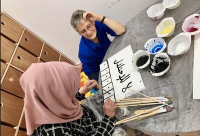 Marie-Claude Quignon, a French  visual artist , working in a Palestinian refugee camp. Courtesy Marie-Claude Quignon