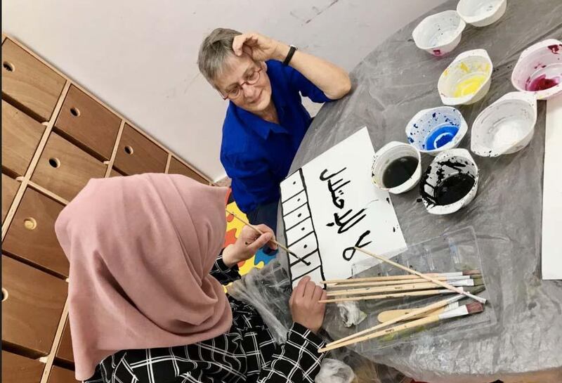 Marie-Claude Quignon, a French  visual artist , working in a Palestinian refugee camp. Courtesy Marie-Claude Quignon