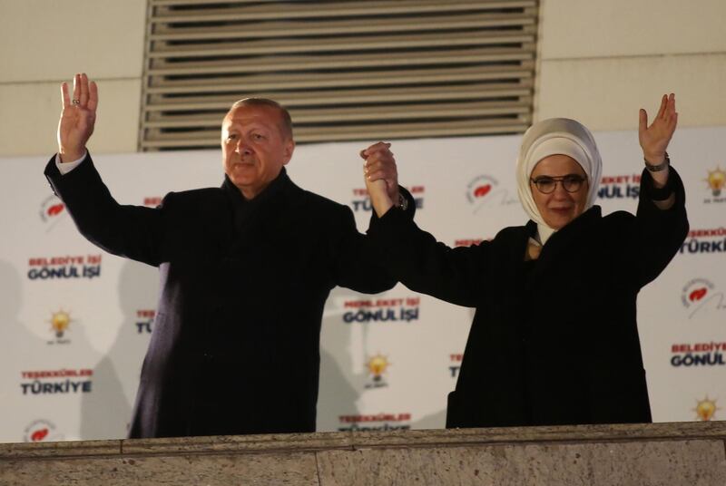 Turkish President Tayyip Erdogan and his wife Emine greet supporters in Ankara. AFP