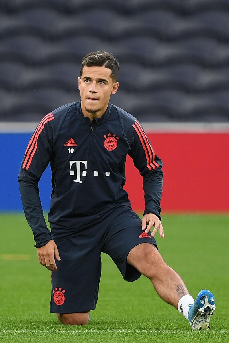 Bayern Munich's Brazilian midfielder Philippe Coutinho stretches. AFP