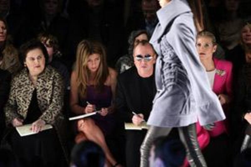 Suzy Menkes with Nina Garcia, Michael Kors and Heidi Klum at the Project Runway fall 2009 fashion show in New York.