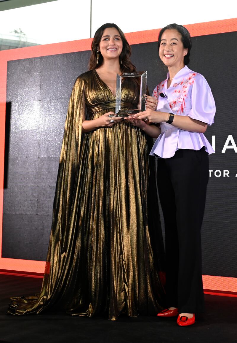 SINGAPORE, SINGAPORE - OCTOBER 02: Alia Bhatt, Actor and Producer receives her award the TIME100 Impact Awards on October 02, 2022 in Singapore. (Photo by Edwin Koo / Getty Images for TIME)