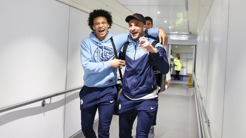 Manchester City players Leroy Sane, left, and Kyle Walker seem to have enjoyed their flight to the capital. Courtesy Manchester City