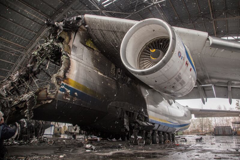 The wreckage of an Antonov AN-225, the world's biggest aircraft, sits under a steel shelter at Gostomel airfield near Kyiv in April 2022. EPA