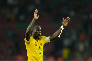 Cameroon's captain Vincent Aboubakar, gestures towards the fans at the end of the African Cup of Nations 2022 group A soccer match between Cape Verde and Cameron at the Olembe stadium in Yaounde, Cameroon, Monday, Jan.  17, 2022.  (AP Photo / Themba Hadebe)