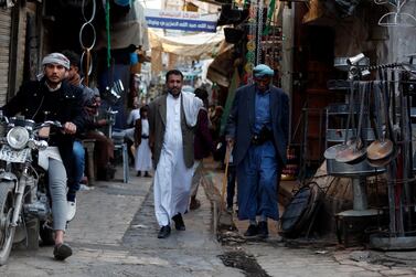 Yemenis walk through a market in the old quarter of Sanaa, Yemen. EPA