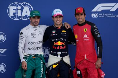 Sergio Perez, centre, starts the Miami Grand Prix on pole and will be joined at the front of the grid by Aston Martin's Fernando Alonso, left. Ferrari's Carlos Sainz qualified third. AP