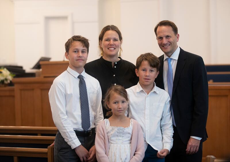 Roland Baeck with his family at the church. The Utah-based faith plans to build a temple near Expo City Dubai. Ruel Pableo for The National