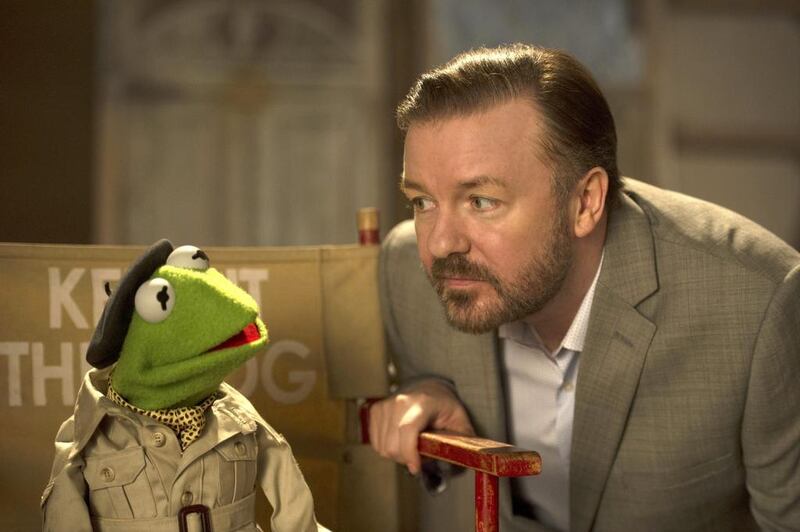 Muppet character Kermit the frog, left, and Ricky Gervais in a scene from the movie. Disney Enterprises, Inc., Jay Maidment / AP photo