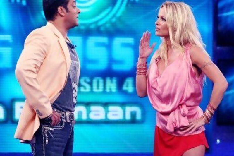 Indian actor Salman Khan with Pamela Anderson on the set of Bigg Boss. Yogen Shah / India Today Group / Getty Images