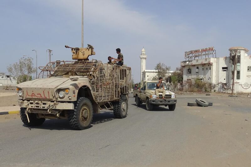 Members of the Yemeni pro-government forces gather at the eastern entrance of the port city of Hodeidah. AFP