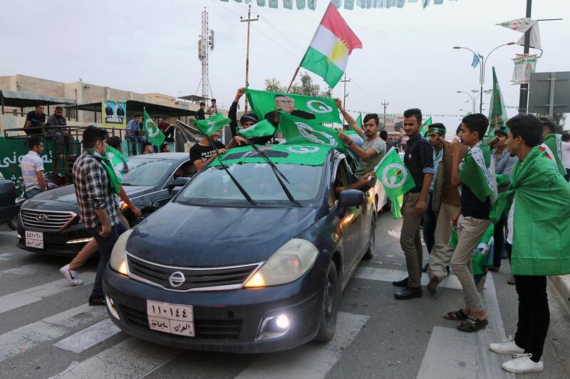 Kurdish supporters of the Patriotic Union of Kurdistan (PUK) celebrate after the closing of ballot boxes during the parliamentary election in Kirkuk, Iraq, May 12, 2018. REUTERS/Ako Rasheed