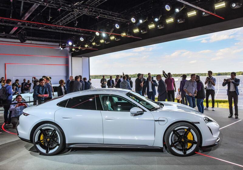 The Porsche Taycan electric car is presented to the public as a world premiere in a hall at the airfield of Neuhardenberg, eastern Germany. AFP