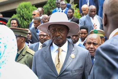 epa08936649 (FILE) - Uganda President Yoweri Museveni (C), looks on after attending the inauguration of the 9th African, Caribbean and Pacific (ACP) Summit of Heads of State and Government at the Kenyatta International Convention Centre (KICC), in Nairobi, Kenya, 09 December 2019 (reissued 14 January 2021). The Ugandan presidential elections takes place on 14 January 2021, with 38-year-old pop star Robert Kyagulanyi, known by his stage name Bobi Wine, emerging as the top opposition challenger against incumbent Ugandan president Museveni, who has been President since 1986.  EPA/DANIEL URUNGU *** Local Caption *** 55694359