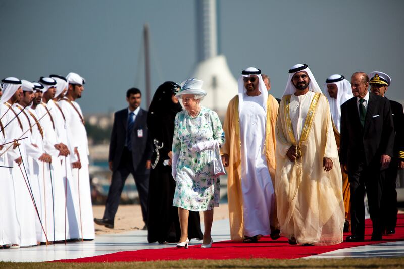 November 25, 2010 - Abu Dhabi, UAE -   Queen Elizabeth II arrives at Emirates Palace with Sheikh Mohammed Bin Zayed Al Nahyan, Crown Prince and Deputy Supreme Commander, middle, Sheikh Mohammed Bin Rashid Al Maktoum, the Prime Minister and Vice President of the United Arab Emirates, right, Sheikh Abdullah Bin Zayed Al Nahyan, Minister of Foreign Affairs, not pictured,  Prince Philip, the Duke of Edinburgh, not pictured, and Prince Andrew, the Duke of York, not pictured, for the unveiling of Zayed National Museum on Thursday November 25, 2010.    (Andrew Henderson/The National)