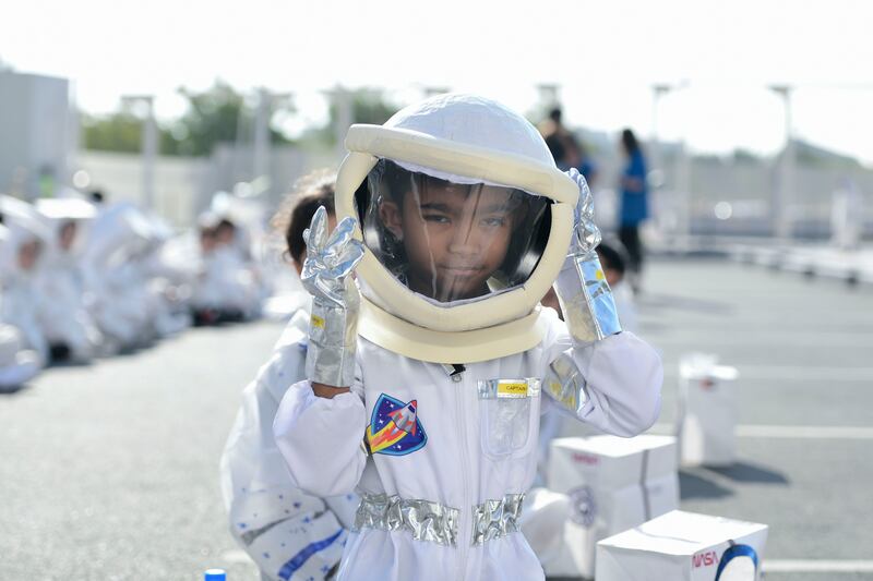Pupils at Repton School in Abu Dhabi set a new Guinness World Record for the largest gathering of people dressed as astronauts. All photos: Khushnum Bhandari / The National