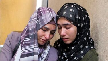 Palestinian women mourn a relative killed in an Israeli strike, during a funeral in Rafah. Reuters
