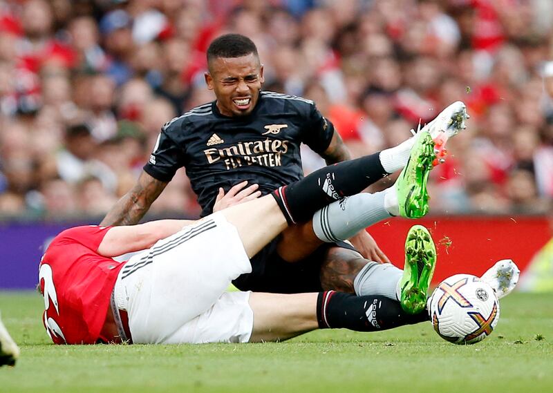 Arsenal's Gabriel Jesus is fouled by Manchester United's Scott McTominay. Reuters