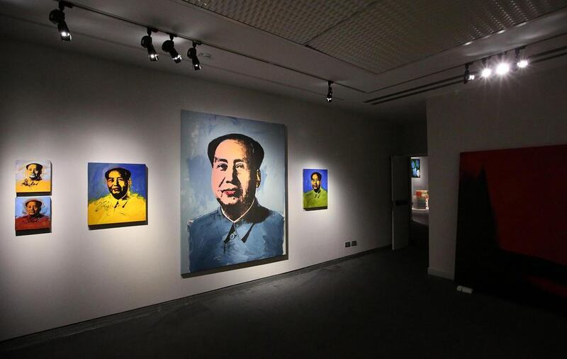 Portraits by US artist Andy Warhol of Chairman Mao are displayed at Andy Warhol’s exhibition at the Museo Fondazione Roma. (Alessandro di Meo / EPA/ 16 April, 2014)