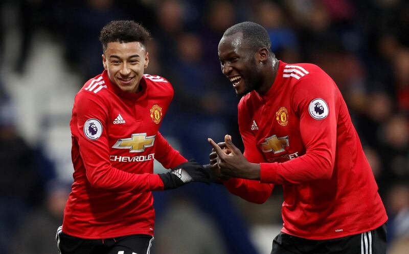 Soccer Football - Premier League - West Bromwich Albion vs Manchester United - The Hawthorns, West Bromwich, Britain - December 17, 2017   Manchester United's Jesse Lingard celebrates scoring their second goal with Romelu Lukaku    Action Images via Reuters/Carl Recine    EDITORIAL USE ONLY. No use with unauthorized audio, video, data, fixture lists, club/league logos or "live" services. Online in-match use limited to 75 images, no video emulation. No use in betting, games or single club/league/player publications.  Please contact your account representative for further details.     TPX IMAGES OF THE DAY