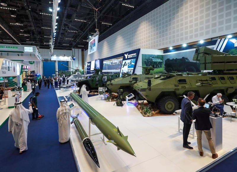 Abu Dhabi, U.A.E., February 20, 2019. INTERNATIONAL DEFENCE EXHIBITION AND CONFERENCE  2019 (IDEX) Day 4--  Visitors look at the military hardware at the YUGOIMPORT stands.
Victor Besa/The National
Section:  NA