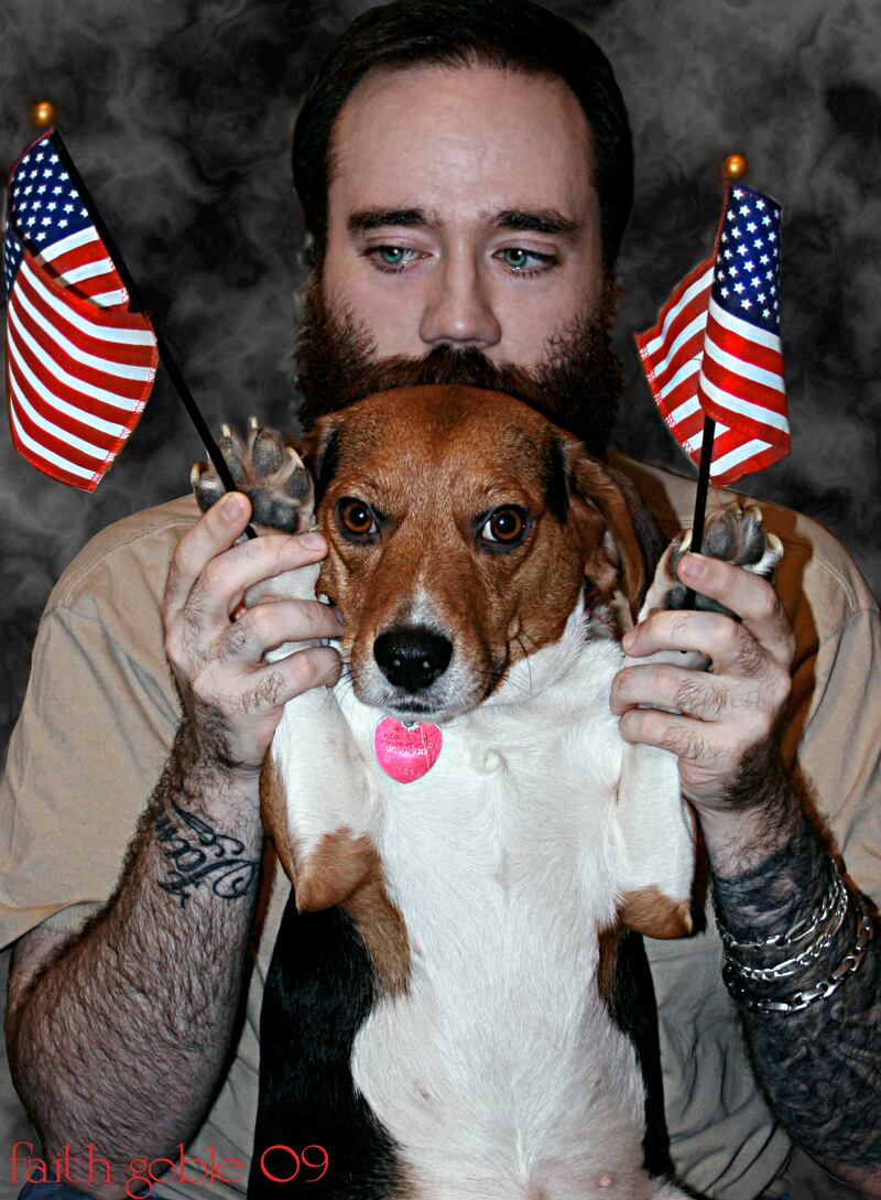 A man and his patriotic dog show their civic pride. Photo Faith Goble