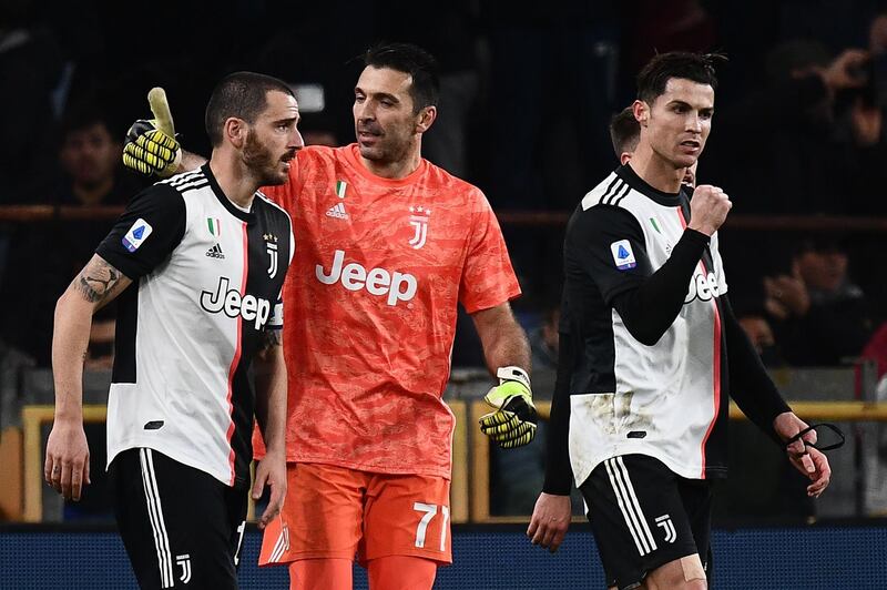 Juventus Italian defender Leonardo Bonucci, goalkeeper Gianluigi Buffon and forward Cristiano Ronaldo at the end of the Serie A match. AFP