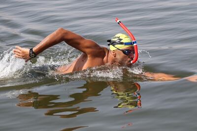 Egyptian monofin swimmer Sayed Baroky training in the Suez Canal in preparation for his world record attempt. Photo: Sayed Baroky