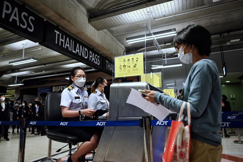 Airport staff practise entering Thailand at Suvarnabhumi International Airport, Bangkok, as they rehearse reopening procedures to welcome the first group of vaccinated tourists without quarantine. AFP