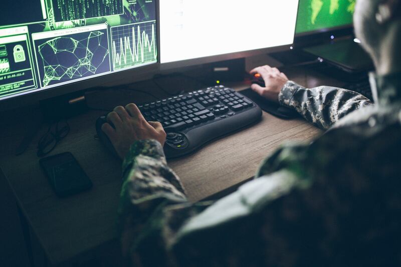 American soldier in headquarter control center. Getty Images