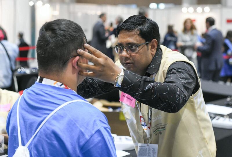 Abu Dhabi, United Arab Emirates - Special Olympics provide free health screenings such as ÔSpecial Olympics-Lions Clubs International Opening EyeÕ with Dr. Javed Ansari at ADNEC during the games. Khushnum Bhandari for The National
