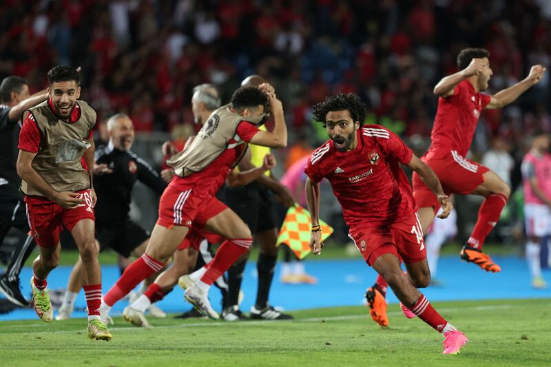 Al Ahly players begin to celebrate after full time in the CAF Champions League final. AFP