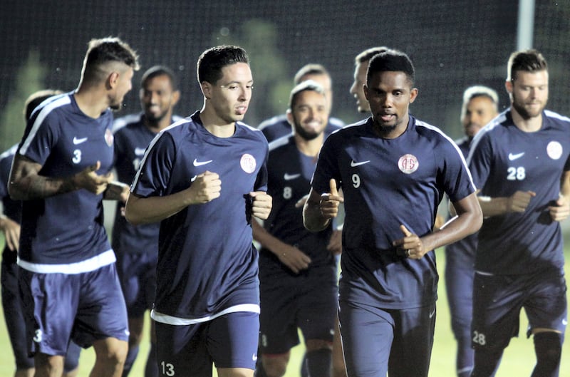Antalyaspor's new French midfielder Samir Nasri (L) runs next to Antalyaspor's Cameroonian forward Samuel Eto'o (R) during his first pratice session after his signing ceremony in Antalya, on August 22, 2017.
Nasri on signed a two year deal to join Turkish top flight side Antalyaspor from Manchester City, the club said. / AFP PHOTO / DEPO PHOTOS / STR / Turkey OUT