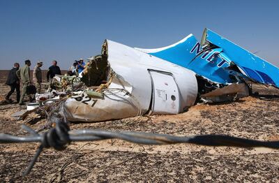 Russian emergency minister Vladimir Puchkov, fourth left, visiting the crash site of a A321 Russian airliner in Wadi Al Zoloma in 2015.