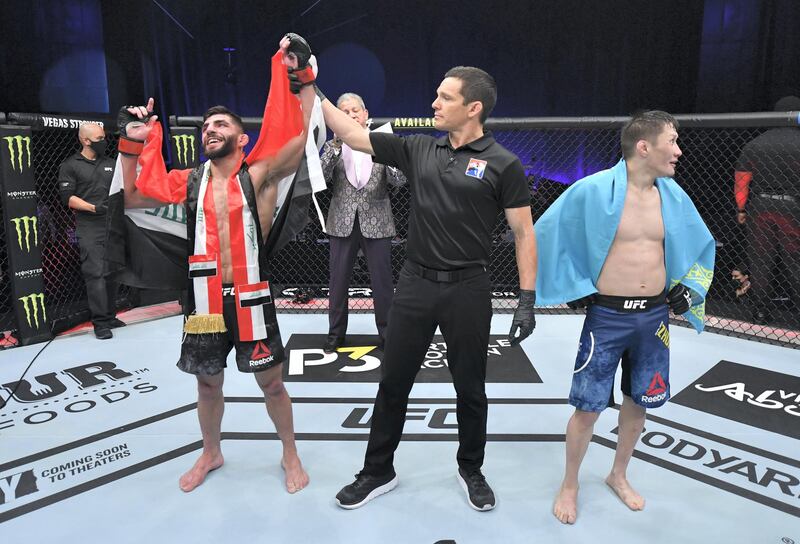 ABU DHABI, UNITED ARAB EMIRATES - JANUARY 23: Amir Albazi of Iraq reacts after his victory over Zhalgas Zhumagulov of Kazakhstan in a flyweight fight during the UFC 257 event inside Etihad Arena on UFC Fight Island on January 23, 2021 in Abu Dhabi, United Arab Emirates. (Photo by Jeff Bottari/Zuffa LLC)