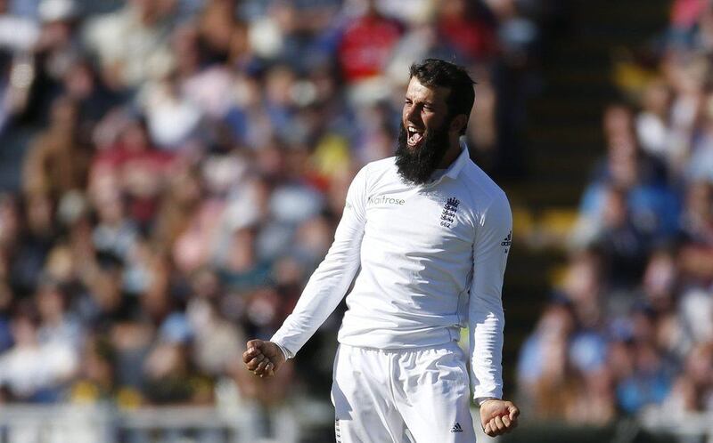 England's Moeen Ali celebrates taking the wicket of Pakistan's Sohail Khan. (Reuters/Paul Childs)