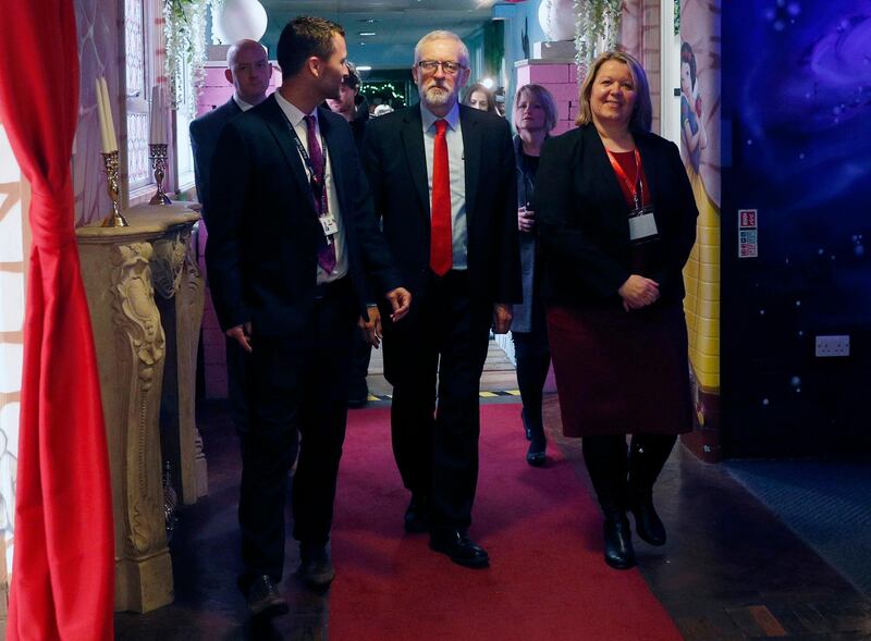 PETERBOROUGH, ENGLAND - DECEMBER 05: Labour Party leader Jeremy Corbyn and candidate Lisa Forbes look at a themed corridor during a visit to Fulbridge Academy on December 05, 2019 in Peterborough, England. Labour is promising to cap class sizes at 30 pupils across all schools in England if they win next Thursday's general election. (Photo by Darren Staples/Getty Images)