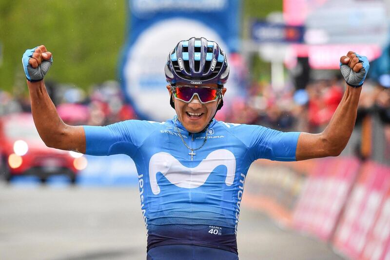 epa07599778 Ecuadorian rider Richard Carapaz of the Movistar Team celebrates after crossing the finish line to win the 14th stage of the 102nd Giro d'Italia cycling race over 131km from Saint-Vincent to Courmayeur, Italy, 25 May 2019.  EPA/ALESSANDRO DI MEO