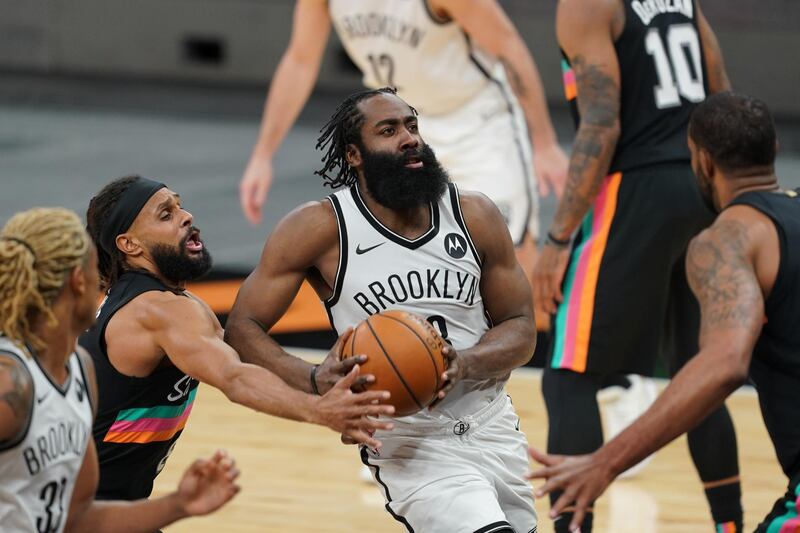Mar 1, 2021; San Antonio, Texas, USA;  Brooklyn Nets guard James Harden (13) goes in for a shot in front of San Antonio Spurs in the second half at the AT&T Center. Mandatory Credit: Daniel Dunn-USA TODAY Sports