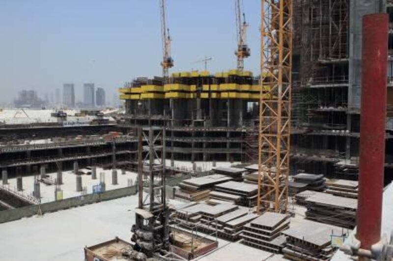 ABU DHABI - 20JUL2011 - Workers have stopped working past two days for not getting their salaries for two months at Tameer Tower construction site on Reem Island named Al Rajhi  properties in Abu Dhabi. Ravindranath K / The National
