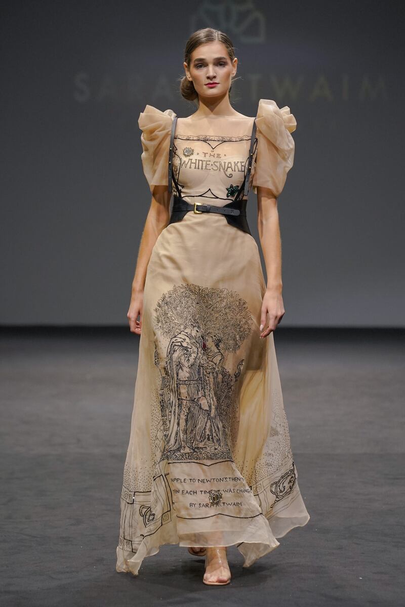 Sara Altwaim embroidered gowns with intricate images at Arab Fashion Week.