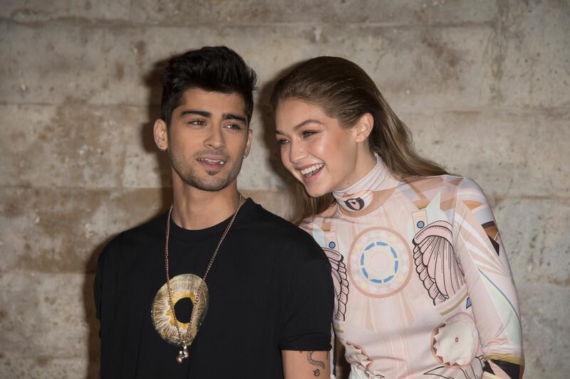 PARIS, FRANCE - OCTOBER 02:  Zayn Malik and Gigi Hadid  attend the Givenchy show as part of the Paris Fashion Week Womenswear Spring/Summer 2017 on October 2, 2016 in Paris, France.  (Photo by Dominique Charriau/WireImage/Getty Images) *** Local Caption ***  on13oc-scene-hadid.jpg